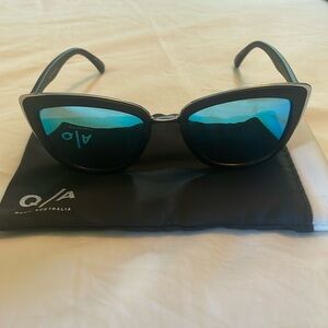 Quay sunglasses, black cat eye frame